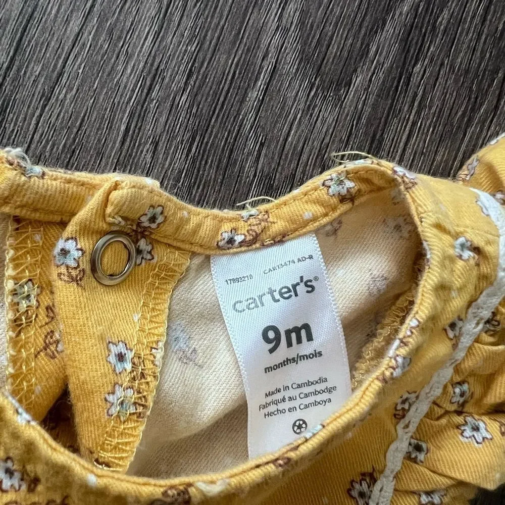 Carter's Ruf­fled Flo­ral-Print Jump­suit 9 m